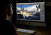 Man using Apple's new iMac Pro