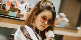 Woman trying out a watch in Sevenfriday Space