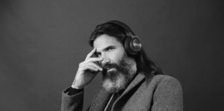 Man wearing Beoplay H9i