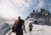 Kratos and Atreus climbing a mountain