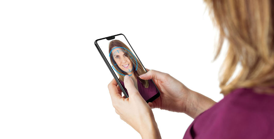 Woman using AI Face Access to unlock Vivo V9
