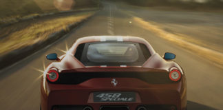 Ferrari driving down a road