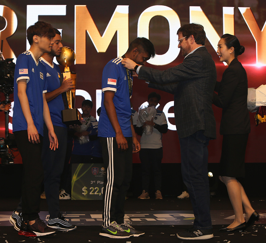 Team Flash being awarded their medals