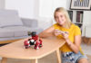 Girl having fun with the GEIO New Generation Gaming Robot