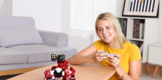 Girl having fun with the GEIO New Generation Gaming Robot