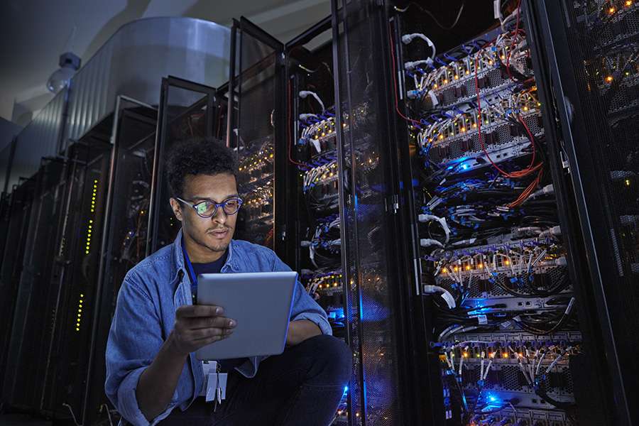 IT technician in data centre server room
