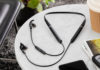 Jabra Evolve 65e wireless neckband earbuds on a table