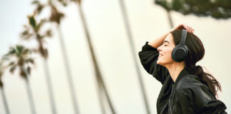 Woman enjoying the WH-XB900N