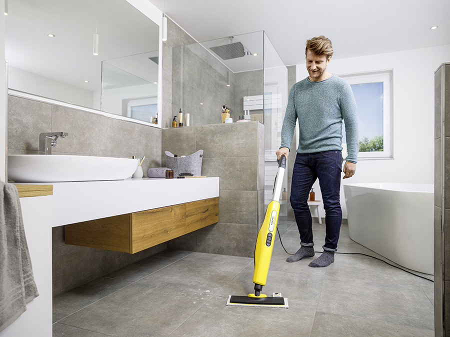 Man using the Karcher SC 3 Upright EasyFix Steam Mop