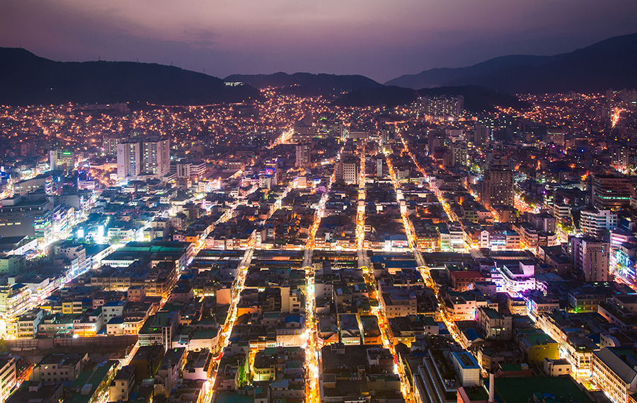 View of Busan cityscape with grid road at night.