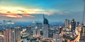 Indonesia, Jakarta, View of city during sunset