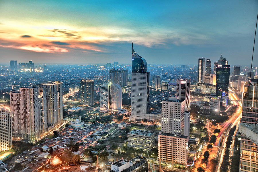 Indonesia, Jakarta, View of city during sunset