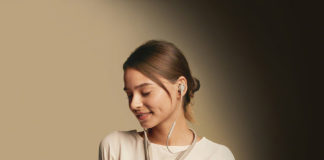 Woman listening to the Sony WI-1000XM2