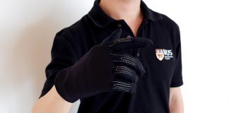 The Infinity Glove is embedded with thread-line microsensors to produce accurate three-dimensional positions of a moving hand, allowing users to mimic a variety of in-game controls using simple gestures. Photo credit: National University of Singapore