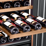 Natural wood racks add sophistication to the Wine Cellar